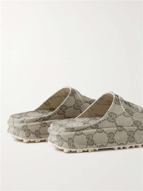 gucci logo embossed rubber slides